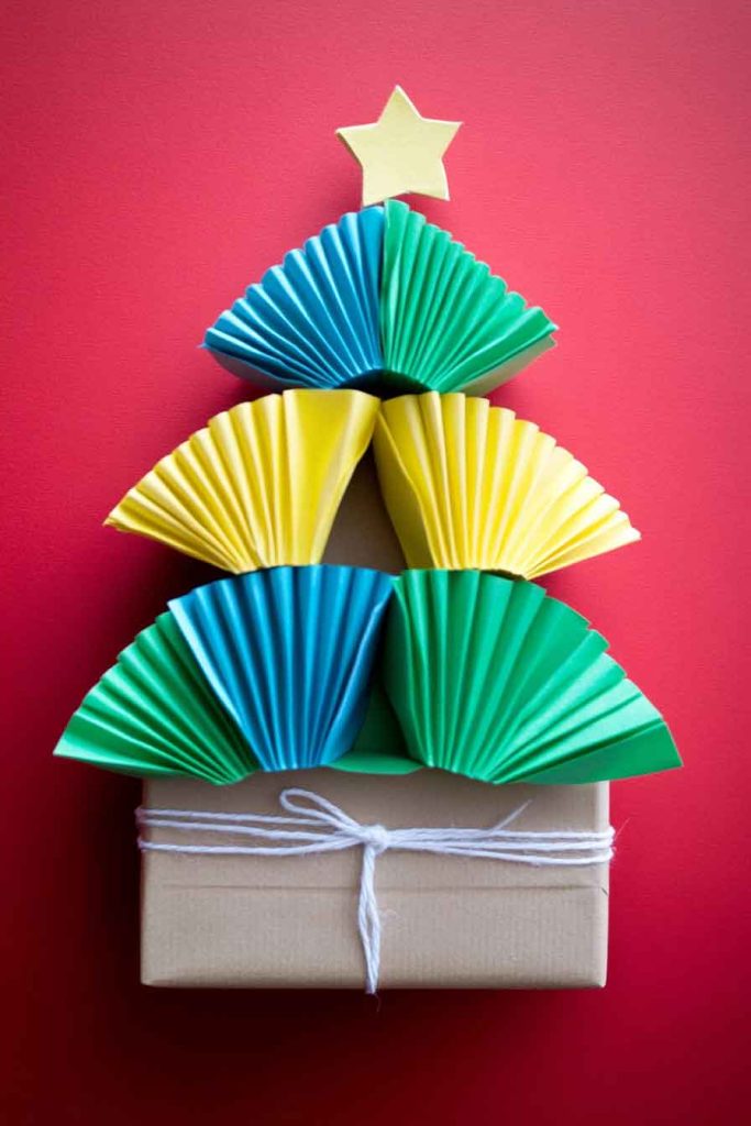 This image shows a bright and creative Christmas wrapping idea that is fun and simple to make