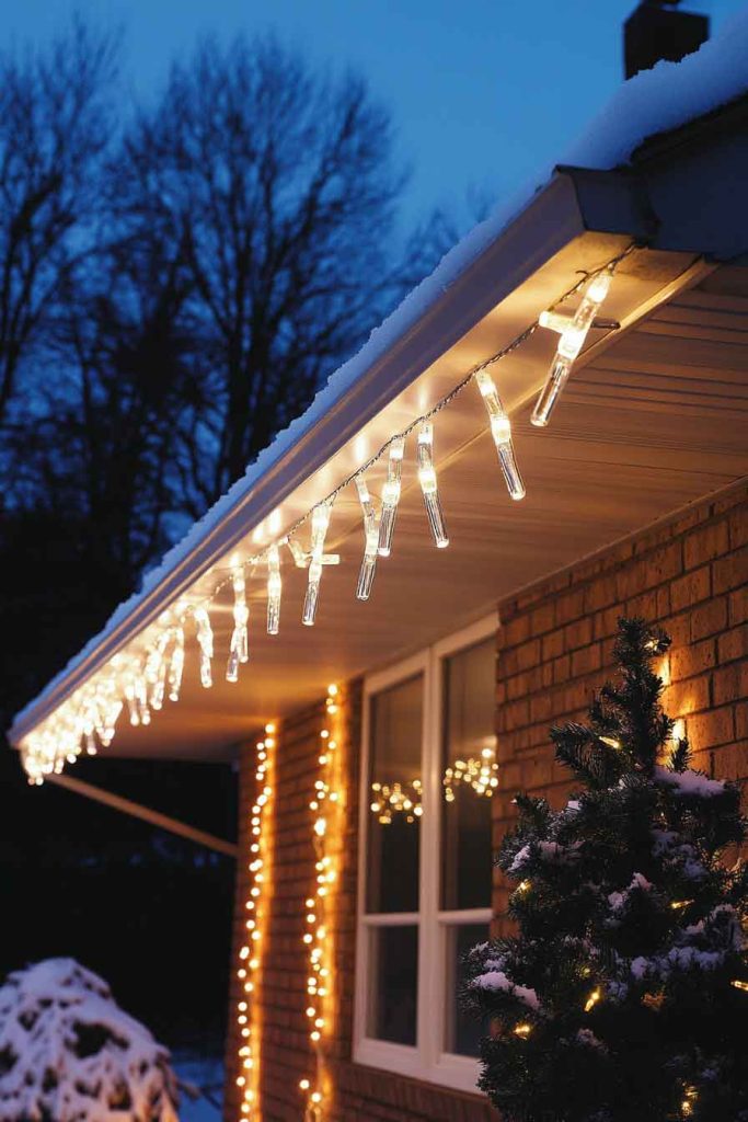 Classic White Icicle Lights Along Roofline