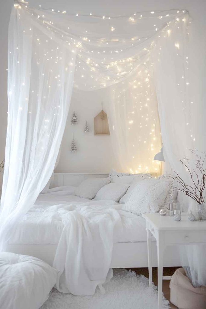 Romantic White Christmas Bedroom with Sheer Canopy
